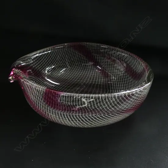 A latticino heavy glass bowl, possibly Czech